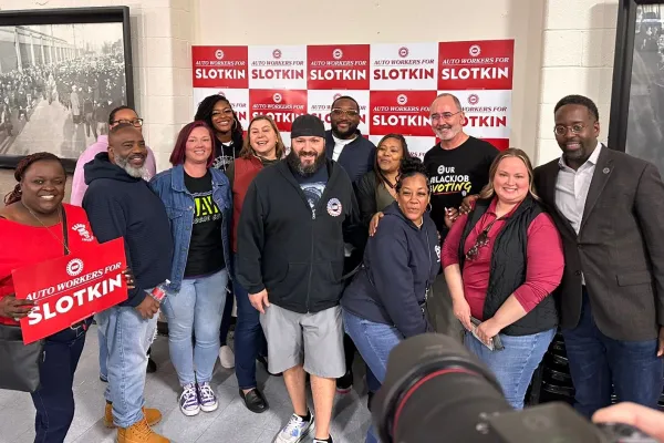 MI Rep. Elissa Slotkin with UAW President Shawn Fain and members at a rally