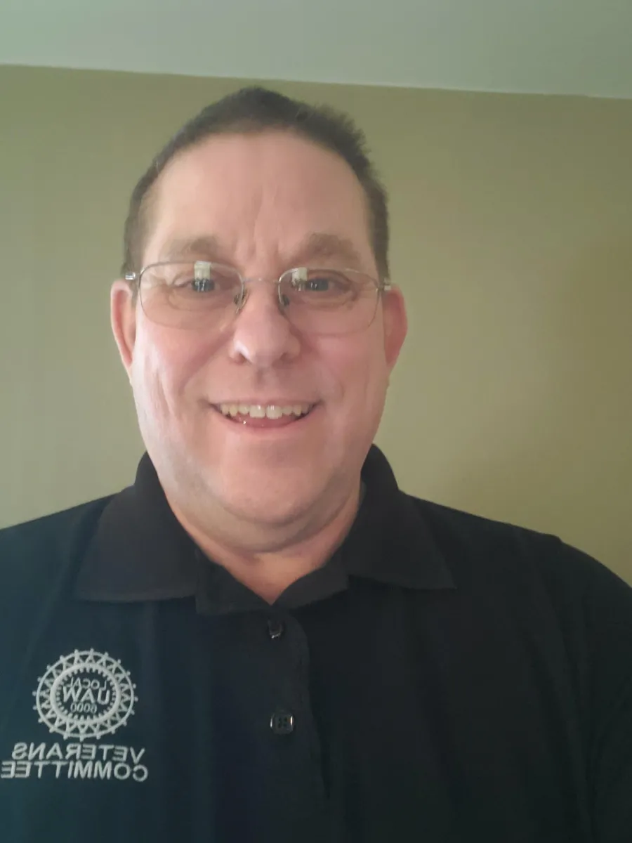 Steve Karber, man with glasses and a black shirt.
